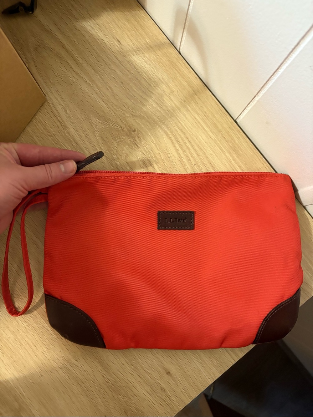 L.L. Bean Bright Orange Wristlet Clutch with Brown Trim